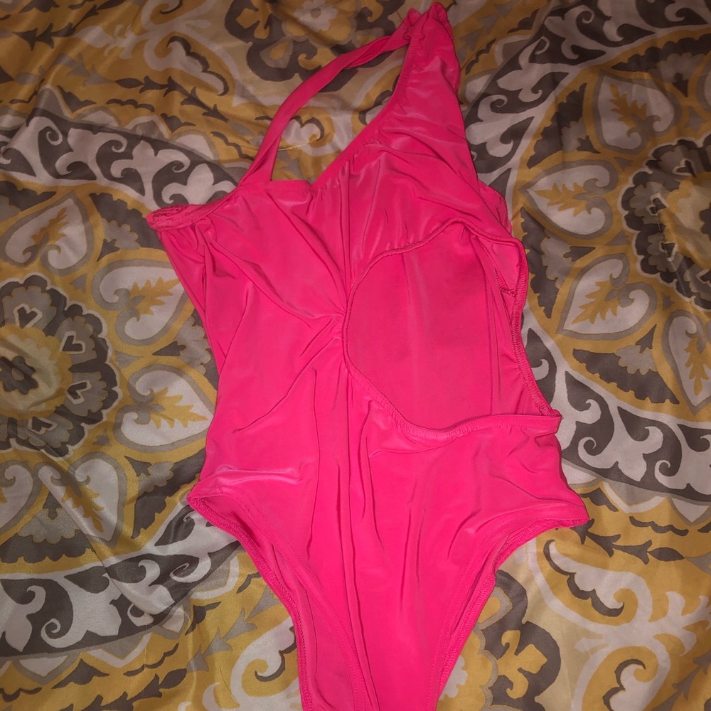 Neon pink over the shoulder body suit